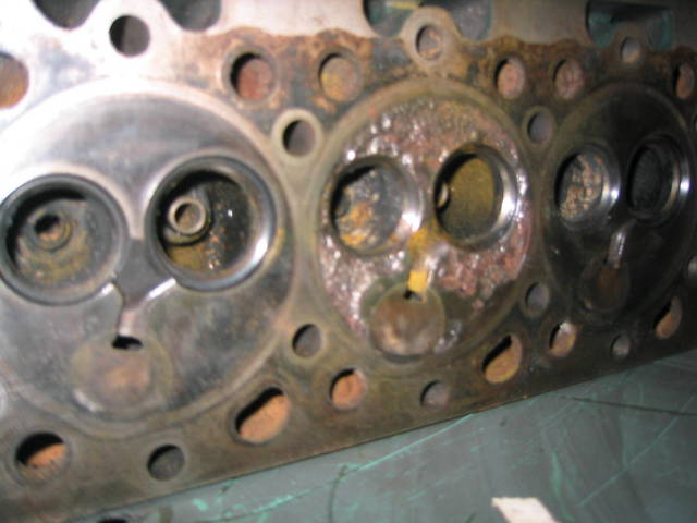 Pitting in the Head and had been Crack Repaired on Exhaust Valve Seat